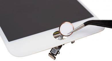 The iPhone 7 Plus’ home button, a touch sensor, is shown during a iFixit’s teardown of the phone in Japan