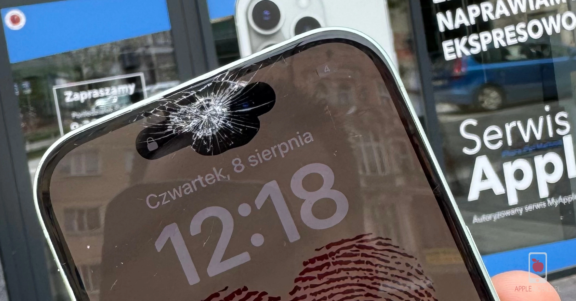 ekran iPhone 14 Pro z wyraźnie widocznym zmiażdżeniem ekranu nad kamerą TrueDepth od selfie